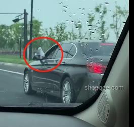 开车禁忌：脚伸窗外玩手机，危险行为大揭秘